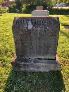 grave marker taken in poor light
